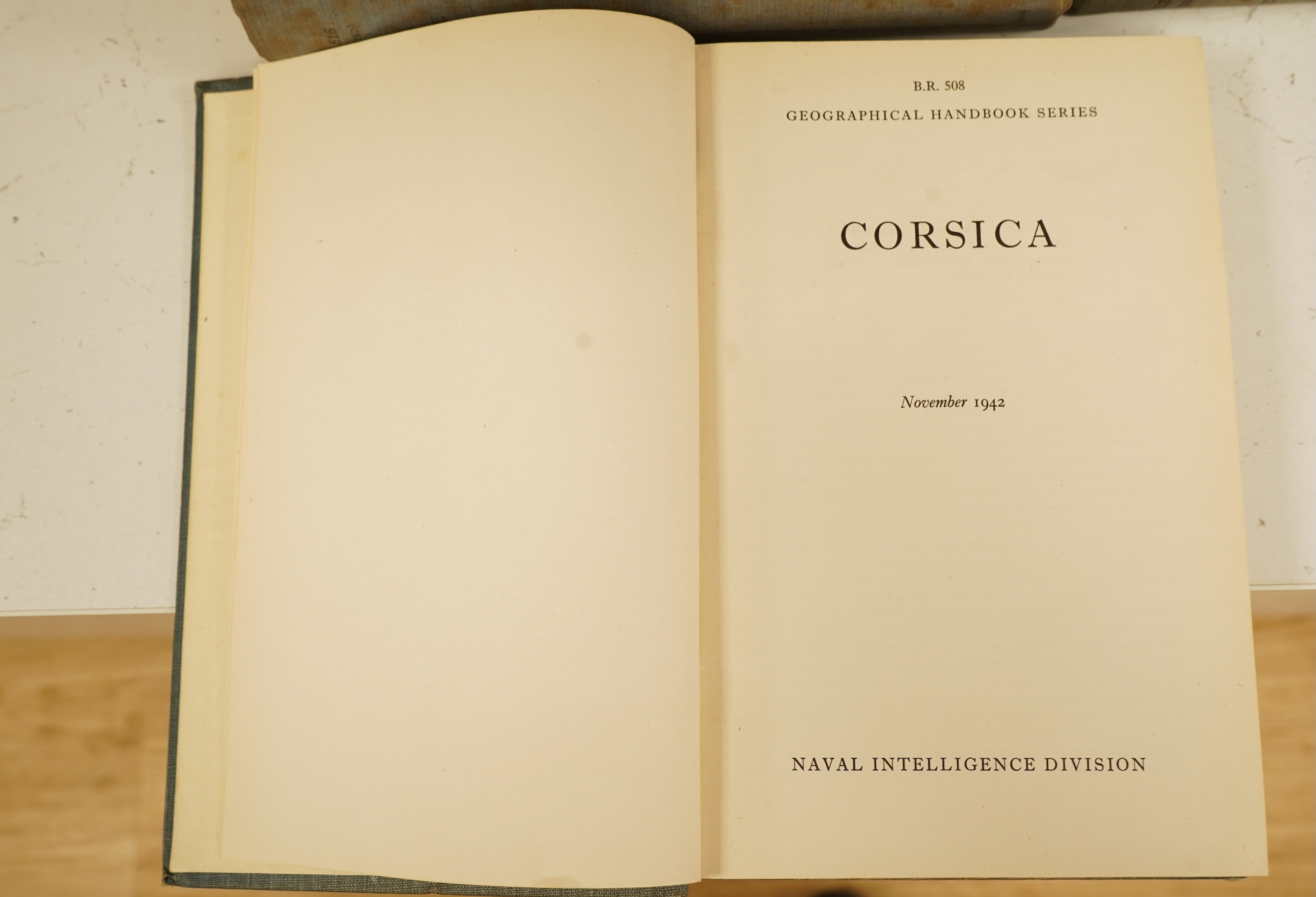Naval Intelligence Division, Geographical Handbook Series - France. (1 pocket map), 4 vols., 1942; Corsica (1 pocket map), 1942; Dodecanese (?no pocket map produced), 1941; Greece (1 pocket map), 3 vols., 1944-45 (9)